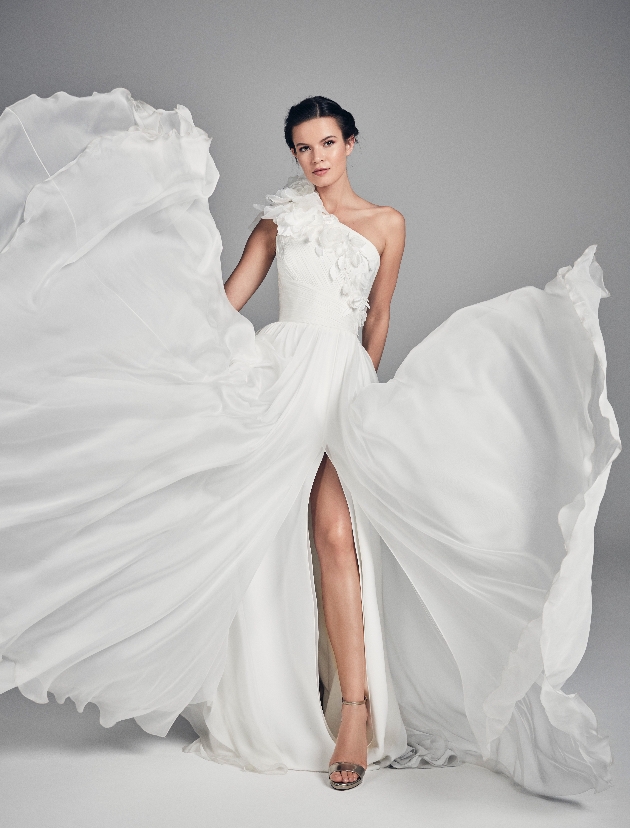 One shouldered bridal gown with high leg split by Suzanne Neville