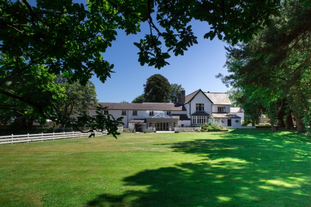 Grass and woodland in front of Llechwen Hall Hotel, Glamorgan