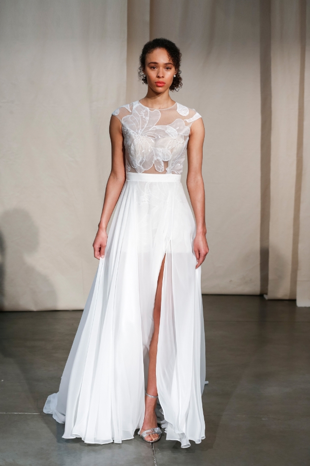 Justin Alexander wedding dress with see-through corset top with flowers