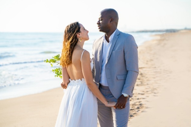 couple wedded on beach