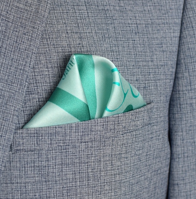 blue pocket square in grey suit jacket