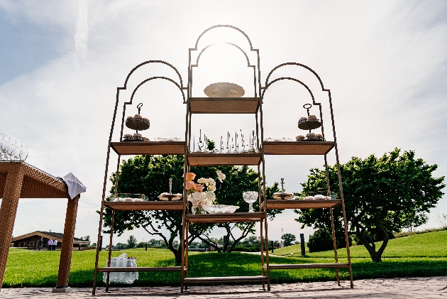 open rustic display stand outside with sweets on