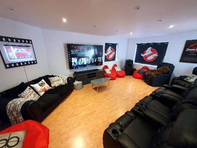 move room in house themed in ghostbusters merchandise