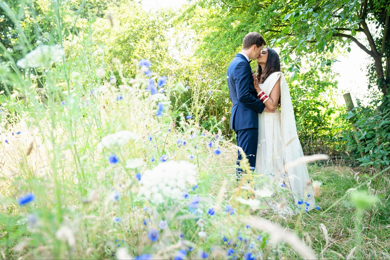 Couple kiss in garden