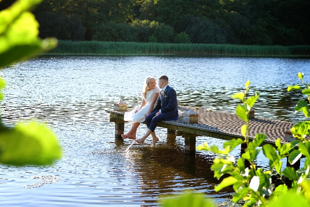 Couple sitting by the river