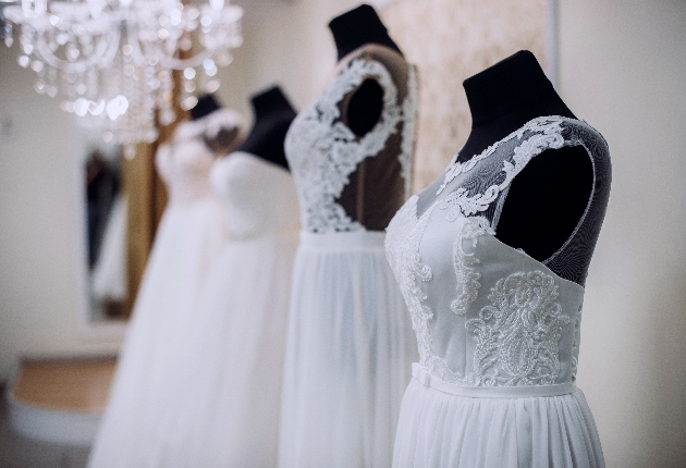 Four wedding dresses on mannequins