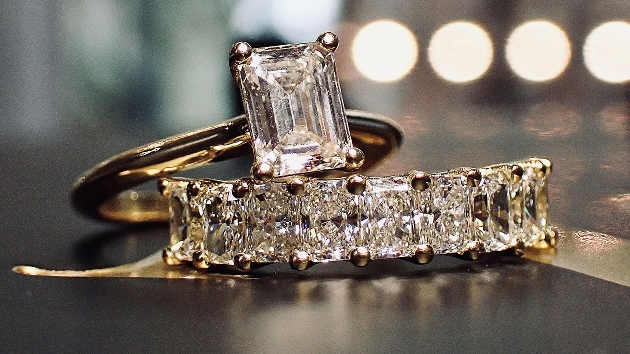A gold engagement ring and wedding ring