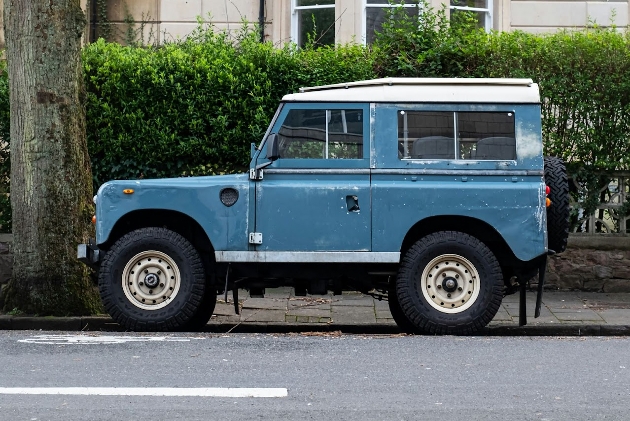 blue with white roof Land Rover Defender