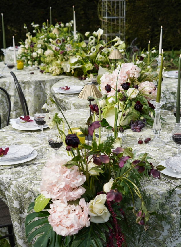 wedding tables with joining flower displays