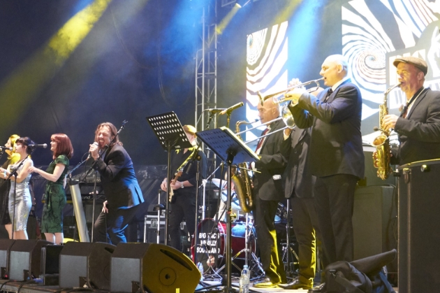 a band performing on stage 