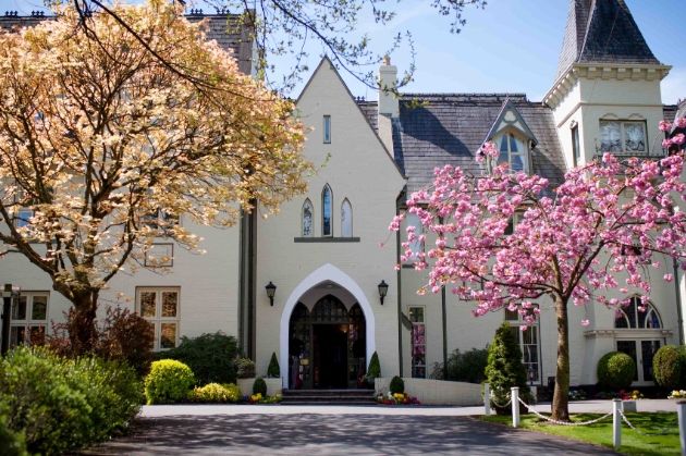Victorian building with cherry tree outside