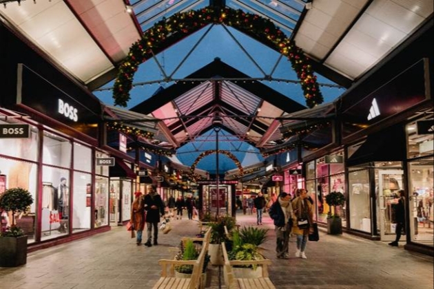 The inside of a shopping centre decorated for Christmas
