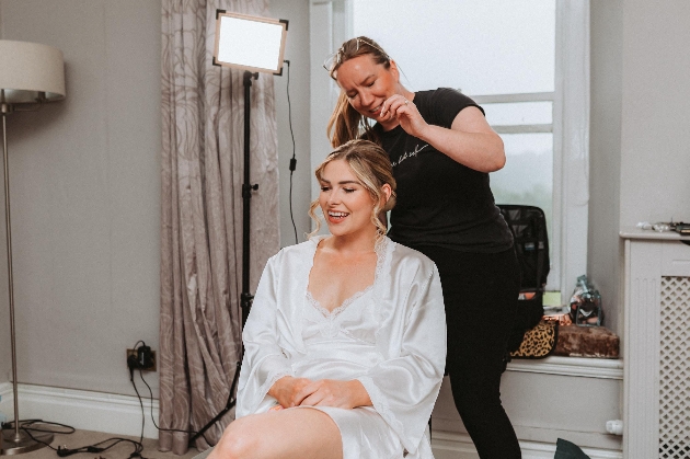 A woman having her hair done