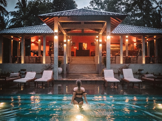 A woman walking out of a swimming pool