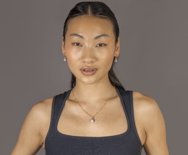 A model wearing Claire Hill Designs' Lichen Gemstone Collection