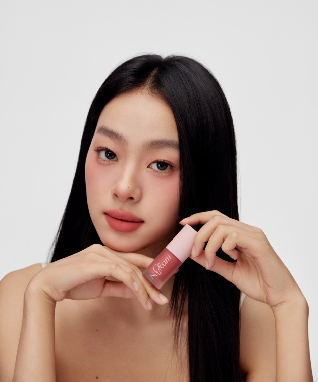 model wearing JOOCYEE Multi-Purpose Lip & Cheek Cream